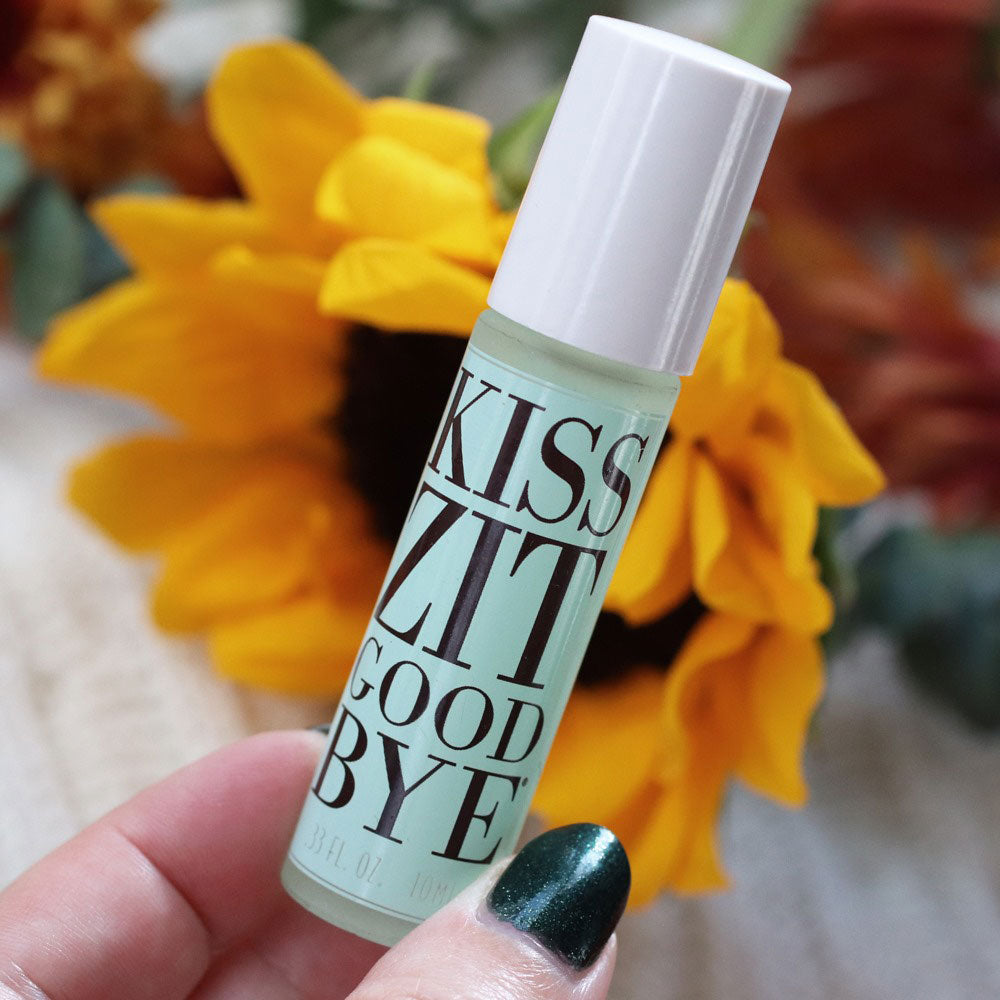 VERABELLA Kiss Zit Goodbye with a sunflower behind