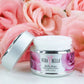 Verabella Bella Rosa cream jar with pink roses in the background