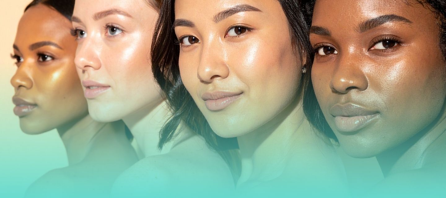 Four women with different skin tones on a gradient background